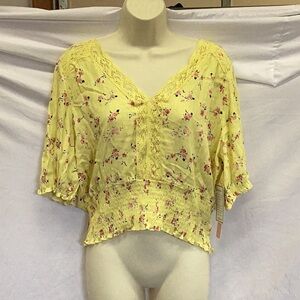 Yellow floral cropped blouse.